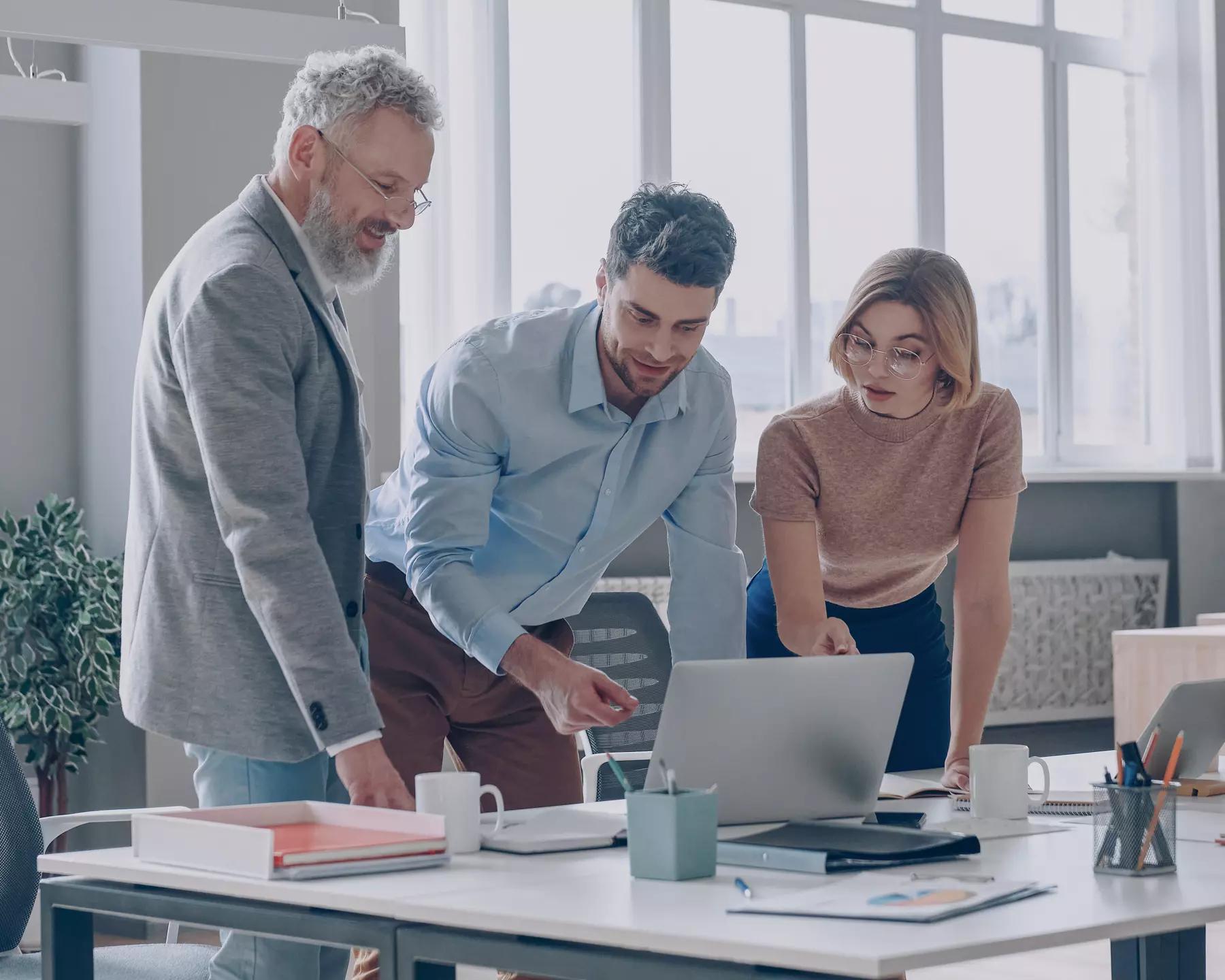 a group of financial advisors looking through advisor resources